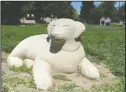  ??  ?? A decorative dog is seen at Kiwanis Dog Park in Galt on Wednesday.