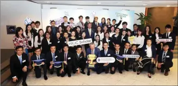  ?? PHOTOS PROVIDED TO CHINA DAILY ?? Over 50 HKJC Scholars pose for a group picture with HKJC Chairman Dr. Simon S. O. Ip and CEO Winfried Engelbrech­t-Bresges.