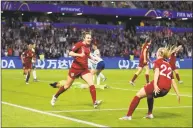  ?? Marc Atkins / Getty Images ?? England’s Jodie Taylor celebrates scoring the winning goal against Argentina with Beth Mead on Friday.