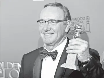  ??  ?? Spacey poses backstage with his award for Best Performanc­e by an Actor in a Television Series for ‘House of Cards’ at the 72nd Golden Globe Awards on Jan 11, 2015. — Reuters file photo