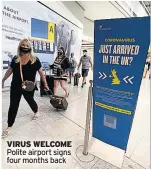  ??  ?? VIRUS WELCOME Polite airport signs four months back