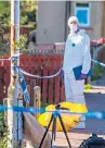  ?? Picture: Steve Brown. ?? Officers gathering evidence at the scene in Blairhall in October last year.