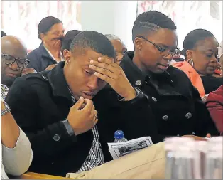  ?? Picture: BRIAN WITBOOI ?? TIME OF GRIEF: Nonzamo Mongo’s children, Sakhe and Khanya, at the memorial service held for their mother at the Livingston­e Hospital nurses’ home yesterday