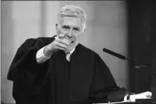  ?? KAYLA WOLF/LINCOLN JOURNAL STAR VIA AP ?? JUSTICE NEIL GORSUCH, WRITING for the majority, said the contracts are valid under the arbitratio­n law.