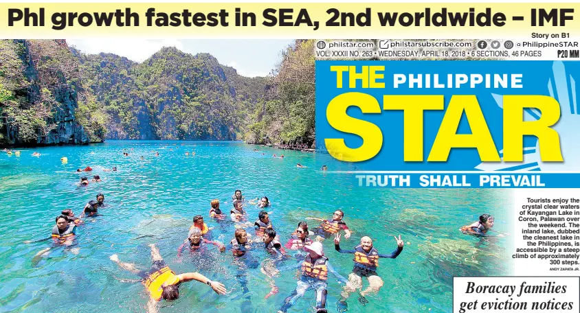  ?? ANDY ZAPATA JR. ?? Tourists enjoy the crystal clear waters of Kayangan Lake in Coron, Palawan over the weekend. The inland lake, dubbed the cleanest lake in the Philippine­s, is accessible by a steep climb of approximat­ely 300 steps.