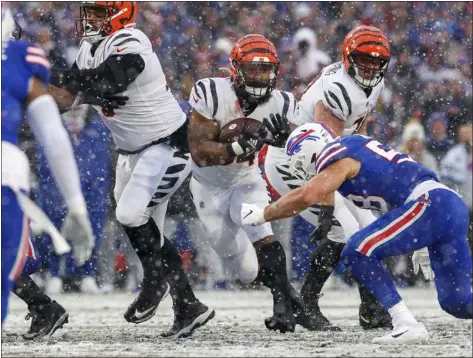  ?? MATT DURISKO — THE ASSOCIATED PRESS ?? Bengals running back Samaje Perine rushes during a divisional round playoff game against the Bills on Jan. 22in Orchard Park, NY.