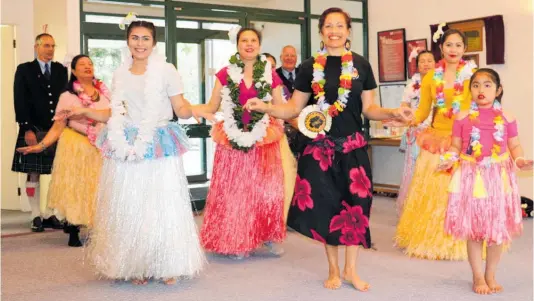  ?? Photos: Christine McKay ?? A cultural group led by staff member Sela Byrne, front centre, entertaini­ng at Eileen Mary rest home last week, performing a piece from Moanathe movie.