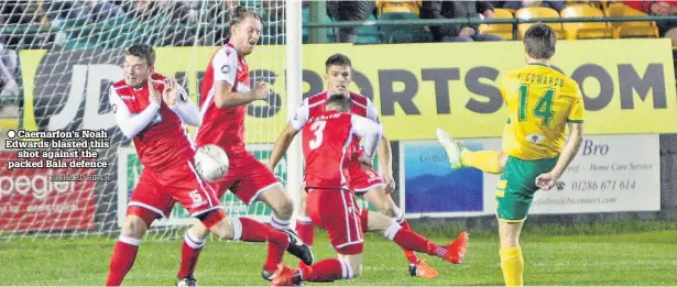  ??  ?? ● Caernarfon’s Noah Edwards blasted this shot against the packed Bala defence