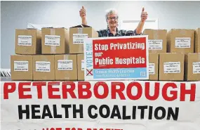  ?? CLIFFORD SKARSTEDT EXAMINER ?? Marion Burton of the Peterborou­gh Health Coalition gestures on Thursday after announcing 20 ballot boxes will be set up around the city and county for people to cast their vote on Bill 60 on May 26 and 27.