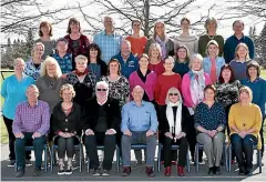  ??  ?? Bill Feasey, front centre, in the 2019 school staff photograph.