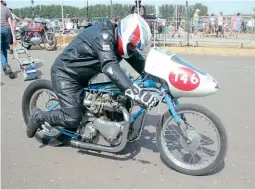  ?? ?? Having got his 750cc Hagon Triumph fired up, Tim Taylor checks for the correct gear.