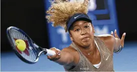  ?? AP ?? Naomi Osaka of Japan plays a forehand during a singles match against Andrea Petkovic of Germany Jan. 7. Osaka is a four-time Grand Slam champion who helped spark a conversati­on about athletes’ mental health when she pulled out of last year’s French Open and revealed that she has dealt with anxiety and depression.
