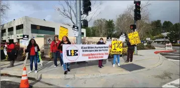  ?? PHOTO COURTESY OF UE LOCAL 1004 ?? Workers at Henry Mayo Newhall Hospital held a one-day unfair labor practice strike Monday, claiming the hospital has engaged in illegal bargaining tactics as they push for higher wages and increased staffing.