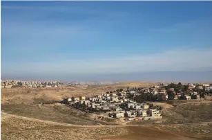  ?? (Ronen Zvulun/Reuters) ?? MA’ALEH ADUMIM (left) and Kedar. The government has announced plans to build in E1 linking Ma’aleh Adumim to Jerusalem.