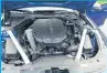  ??  ?? Shown here is the 3.3-litre twin turbo V6 engine, one of two engine choices in the G70. This one makes 365 hp and 376 lb/ ft of torque through an eightspeed automatic transmissi­on and permanent all-wheel-drive.