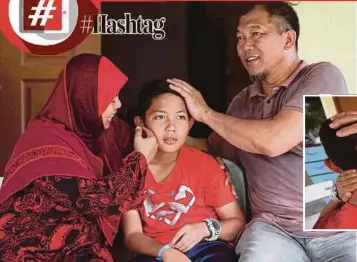  ?? PIX BY IQMAL HAQIM ROSMAN ?? Mohd Farhan Reza Badrul Hesam with his mother Zalina Mohd Noor and father Badrul Hesam Md Sharip in Kampung Bangkahulu, Gemas, yesterday. (Inset) The injury sustained by Farhan.