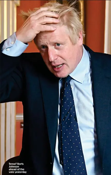  ??  ?? Tense? Boris Johnson ahead of the vote yesterday