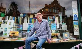  ?? Photograph: Christophe­r Thomond/The Guardian ?? Bookshop owner Colin Lyall organises monthly meet-ups in Todmorden for UFO enthusiast­s.