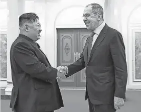  ?? ?? North Korean leader Kim Jong Un and Russian Foreign Minister Sergey Lavrov meet Thursday. Lavrov arrived in the North Korean capital, Pyongyang, Wednesday.