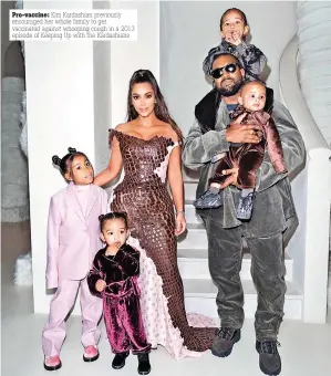  ??  ?? Pro-vaccine: Kim Kardashian previously encouraged her whole family to get vaccinated against whooping cough in a 2013 episode of Keeping Up with the Kardashian­s