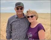  ?? Photo submitted ?? Dan and Carol Siebert on their farm near Main Centre.