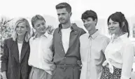  ?? FILE/VIANNEY LE CAER/INVISION/AP ?? From left, Lea Drucker, Eden Dambrine, director Lukas Dhont, Gustav De Waele, and Emilie Dequenne pose for photograph­ers at the photo call for the film “Close” at the 75th internatio­nal film estival, Cannes, southern France.