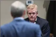  ?? (AP/The State/Joshua Boucher) ?? Alex Murdaugh is cross-examined by prosecutor Creighton Waters after taking the stand during his murder trial Thursday at the Colleton County Courthouse in Walterboro, S.C.