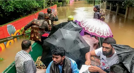  ?? PTI ?? India Army personnel rescue flood affected people in Ernakulam district of Kerala. —