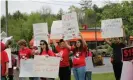  ?? Myles Green ?? Striking Wendy’s workers demand respect in Weavervill­e, North Carolina. Photograph: