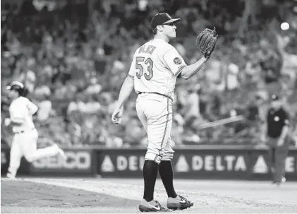  ?? FRANK FRANKLIN II/AP ?? Orioles relief pitcher Branden Kline (53) reacts as the Yankees’ Mike Ford, background left, runs the bases after hitting a home run during the fourth inning of the second game of a doublehead­er Monda in New York.