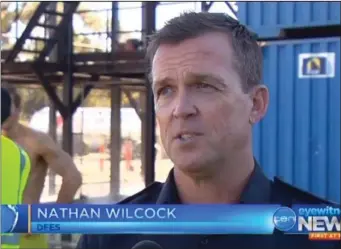  ??  ?? Nathan Wilcock being interviewe­d on Australian television and tackling a blaze (below).