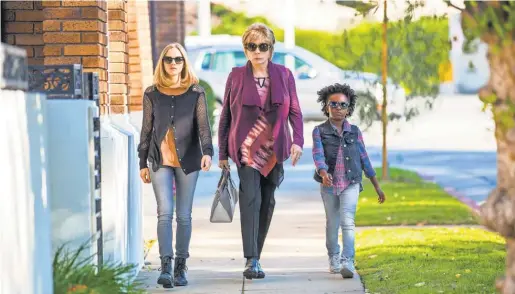  ?? BETH DUBBER ?? Amanda Seyfried, left, Shirley MacLaine and AnnJewel Lee Dixon star in The Last Word, which opens nationwide March 24. MacLaine portrays tough retired businesswo­man Harriet Lauler. “I love playing bitchy roles,” she says.