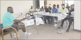  ?? (Courtesy pic) ?? Kenyan tennis expert Oketch George leading the Developmen­t of National Sports Structure session held at EOCGA offices in Lobamba for the Eswatini National Tennis Associatio­n.