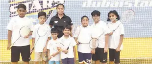  ??  ?? Deepika’s Badminton Academy coach Sriyani Deepika poses with the young shuttlers.