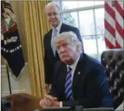  ?? PABLO MARTINEZ MONSIVAIS — THE ASSOCIATED PRESS FILE ?? President Donald Trump with Health and Human Services Secretary Tom Price are seen in the Oval Office of the White House in Washington. The Trump administra­tion and House Republican­s are asking a federal appeals court for a 90-day extension in a case...