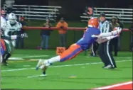  ??  ?? Oneida senior Will Merrell lays out for a first quarter touchdown during a 41-33victory over Marcelus in the Class B semifinals in Verona on Friday, Nov. 1.