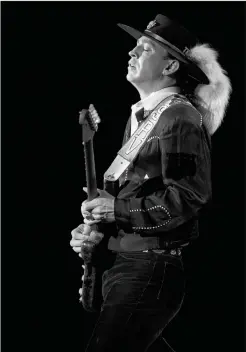  ?? Democrat-Gazette/Art Meripol) ?? This photo of Stevie Ray Vaughan is one of Meripol’s favorites, he said, because the musician was lost in his music. It was later licensed as the cover of “Texas Flood — The Inside Story of Stevie Ray Vaughan.”
(Special to the