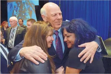  ?? GREG SORBER/JOURNAL ?? Steve Pearce hugs supporters Audrey Trujillo, left, of Corrales and Stella Padilla of Albuquerqu­e after his concession speech at the Crowne Plaza Hotel in Albuquerqu­e on Tuesday night.