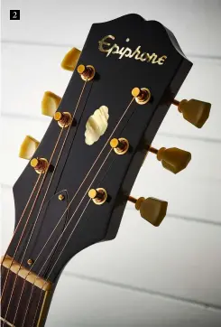  ??  ?? 2 2. Here’s the short form of the Epiphone headstock. After 1961, most Epi models adopted the longer ‘hourglass’ version. Note the bullet truss rod cover, gold ‘keystone’ tuners and ‘cloud’ central inlay