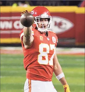  ?? Reed Hoffmann / Associated Press ?? Kansas City Chiefs tight end Travis Kelce signals a first down after making a catch against the Buffalo Bills during the AFC championsh­ip on Sunday in Kansas City, Mo.