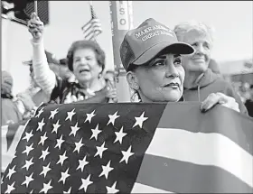  ?? AP/ERIC GAY ?? Supporters of President Donald Trump wait for his arrival Thursday at McAllen Internatio­nal Airport in southern Texas.