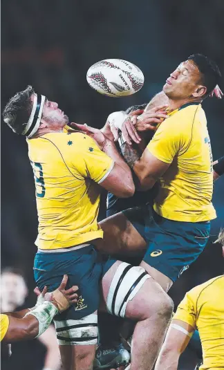  ?? Picture: GETTY IMAGES ?? Israel Folau (right) and Izack Rodda compete for the ball in Dunedin.