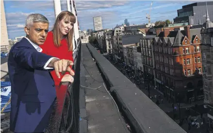  ?? PHOTOGRAPH: AARON CHOWN/PA ?? Sadiq Khan, pictured above Oxford Street with Labour’s Angela Rayner, has proposed a traffic ban