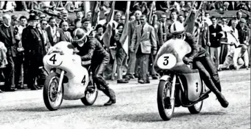  ?? DON MORLEY ?? Above: John Surtees and Mike Hailwood push off 1961 TT.