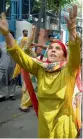  ?? — PTI ?? Women shout slogans during a protest in Srinagar on Friday.