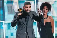  ?? PHOTO BY MATT SAYLES/INVISION/AP ?? Drake accepts the award for best rap song for “God’s Plan” at the annual Grammy Awards on Sunday.