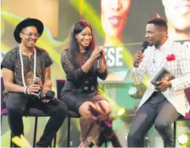  ??  ?? FAKES. Jon and Ese on stage with host Ebuka Obi-Uchendu.