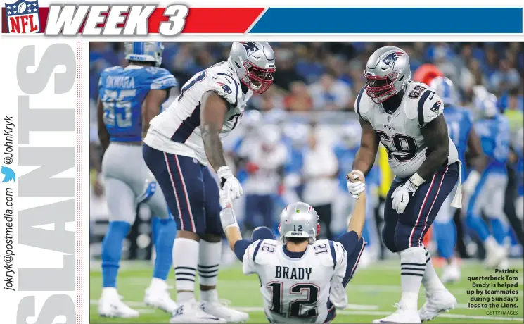  ?? GETTY IMAGES ?? Patriots quarterbac­k Tom Brady is helped up by teammates during Sunday’s loss to the Lions.