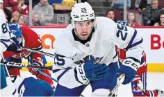  ?? MINAS PANAGIOTAK­IS GETTY IMAGES FILE PHOTO ?? Toronto Maple Leafs defenceman and Thorold native Conor Timmins is among 100 Ontario Hockey League graduates completing in this year’s Stanley Cup playoffs.