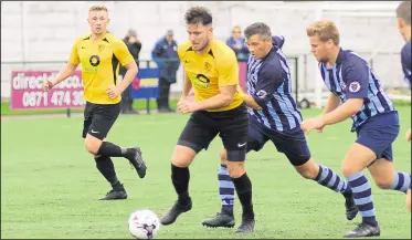  ?? Pictures: Paul Amos FM19222771, right; FM19222779, left ?? Right, Kennington cause havoc in the Crowboroug­h penalty area. Left, the home side push forward